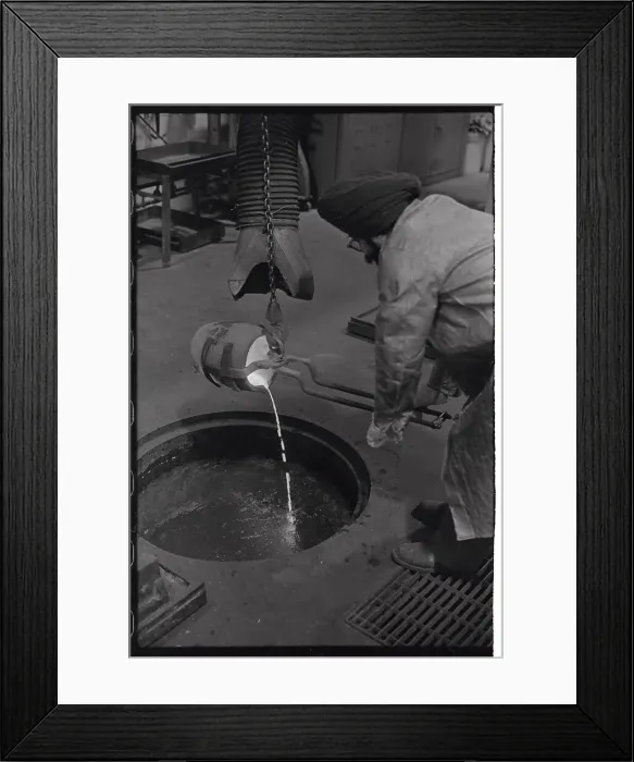 Framed Print : Plant Worker Pouring Molten Gold Framed Print : Plant Worker Pouring Molten Gold
