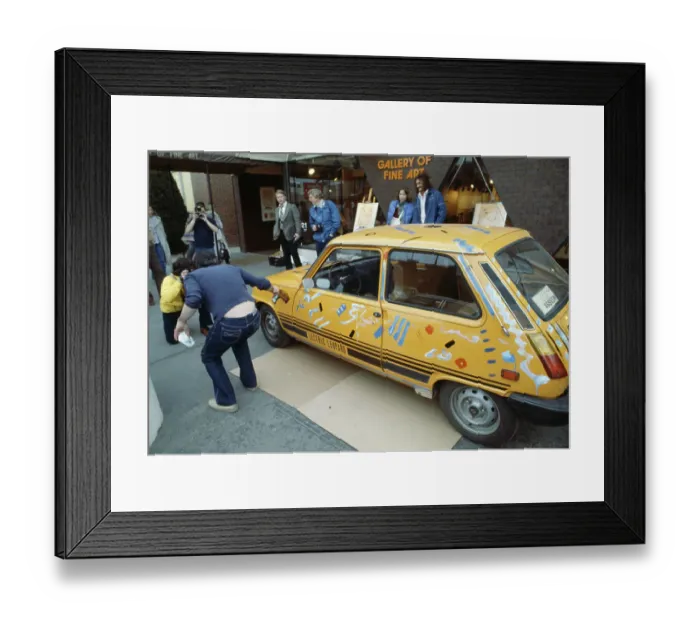 Framed Print : Artist Peter Max Painting A Car Framed Print : Artist Peter Max Painting A Car
