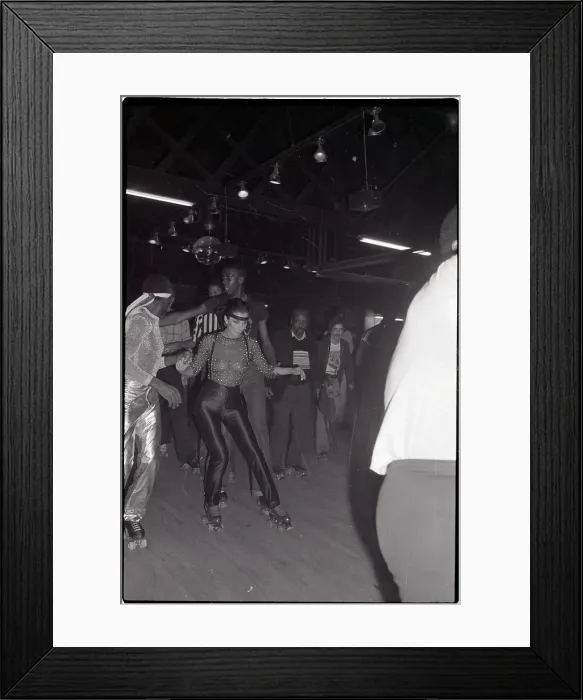 Framed Print : Cher Hosts a Roller Disco Party Framed Print : Cher Hosts a Roller Disco Party