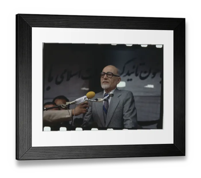 Framed Print : Mehdi Bazargan Speaking into Microphone