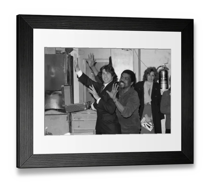Framed Print : Choreographer Alvin Ailey Giving John Travolta Pointers Framed Print : Choreographer Alvin Ailey Giving John Travolta Pointers