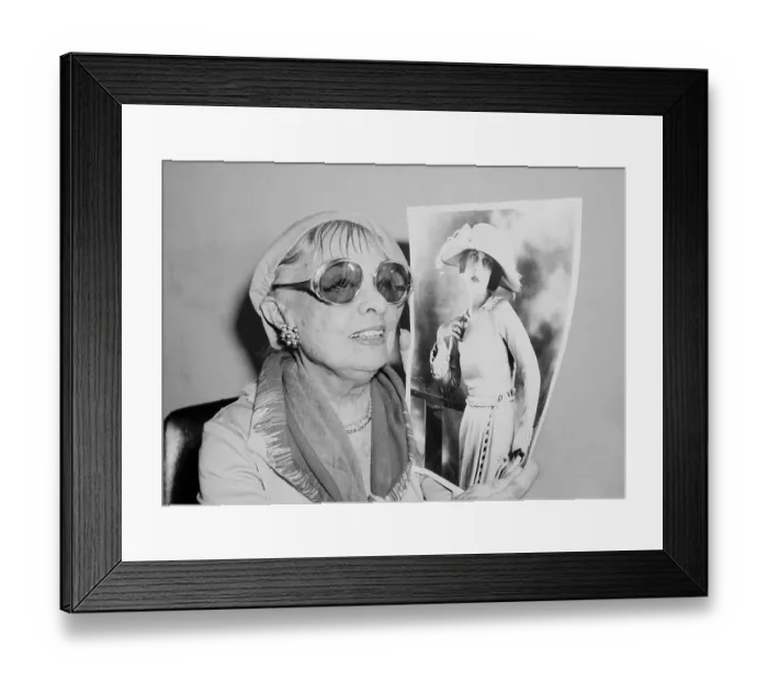Framed Print : Anita Loos Holding Portrait of Herself Framed Print : Anita Loos Holding Portrait of Herself