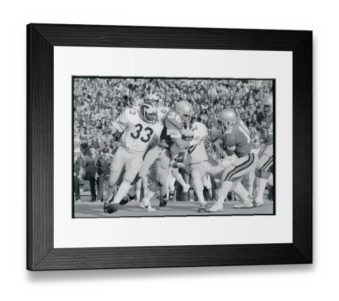 Framed Print : Football Player Performing Tackle Framed Print : Football Player Performing Tackle