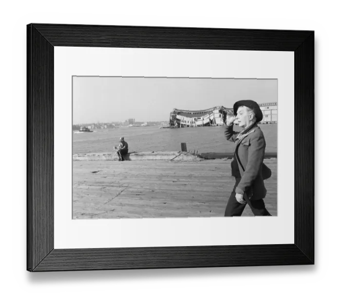 Framed Print : Quentin Crisp Strolls on Pier Framed Print : Quentin Crisp Strolls on Pier