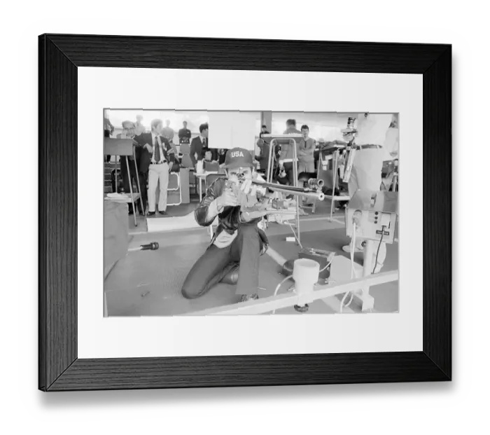 Framed Print : Man Aiming Rifle Framed Print : Man Aiming Rifle