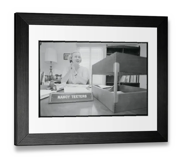 Framed Print : Nancy Teeters Sitting at Her Desk Framed Print : Nancy Teeters Sitting at Her Desk