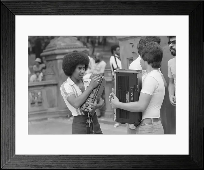 Framed Print : Youngsters Carrying Bulky Audio Equipment
