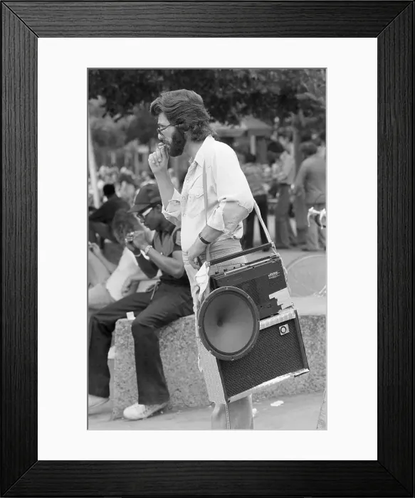 Framed Print : Youngster Carrying Portable Stereo Radio Framed Print : Youngster Carrying Portable Stereo Radio