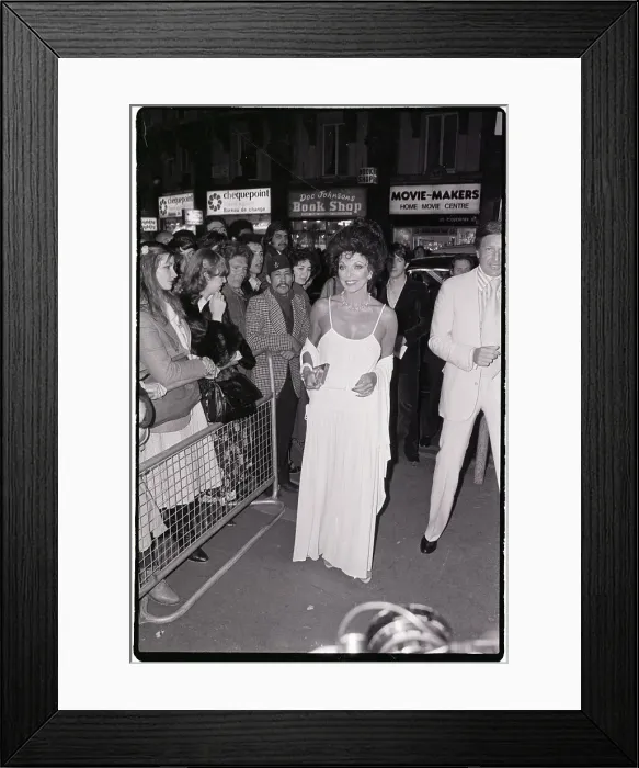 Framed Print : Joan Collins Arrives at Movie Premiere Framed Print : Joan Collins Arrives at Movie Premiere