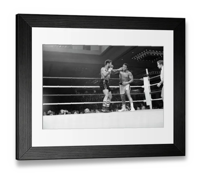 Framed Print : Muhammad Ali & Leon Spinks Exchange Punc