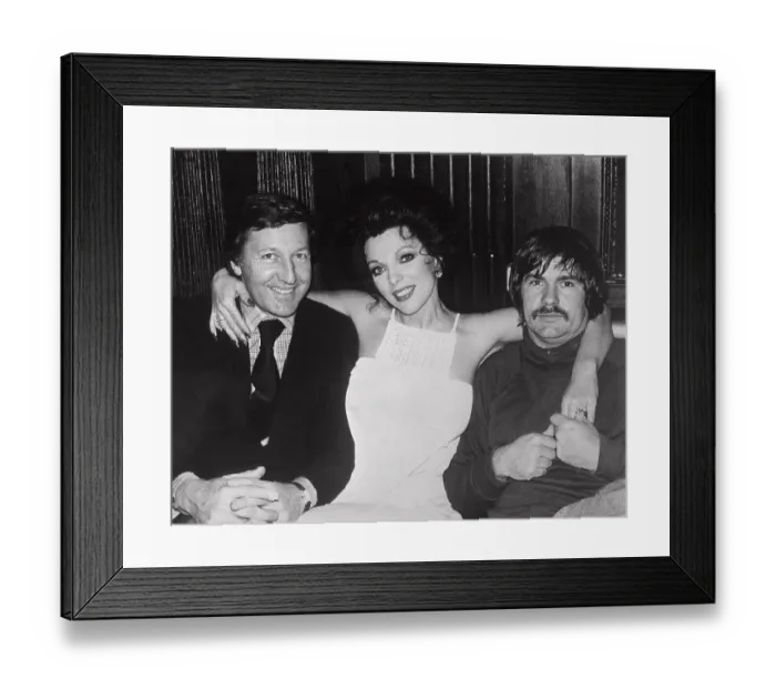 Framed Print : Joan Collins Sitting Between Husband and Director of Film Framed Print : Joan Collins Sitting Between Husband and Director of Film