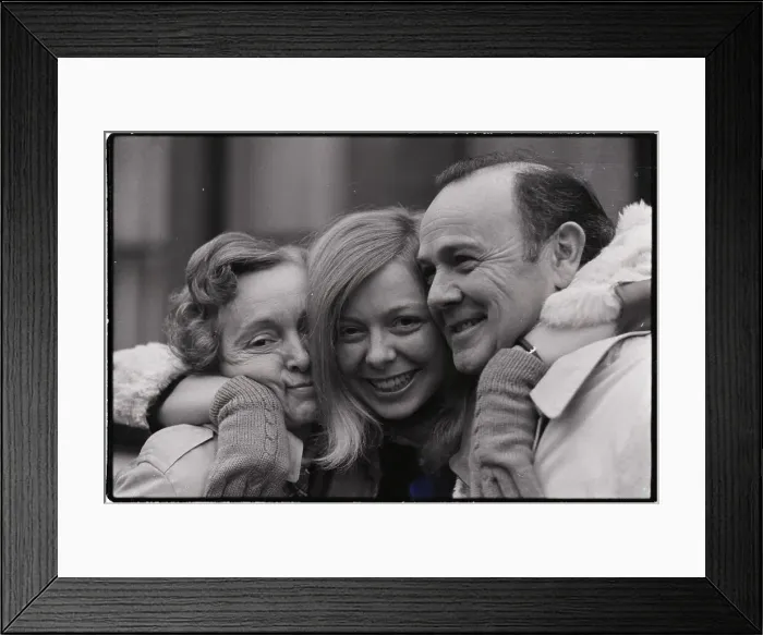 Framed Print : Kidnapping Suspect Hugs Parents