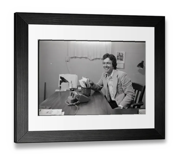 Framed Print : Rennie Davis Working at Desk in Office Framed Print : Rennie Davis Working at Desk in Office