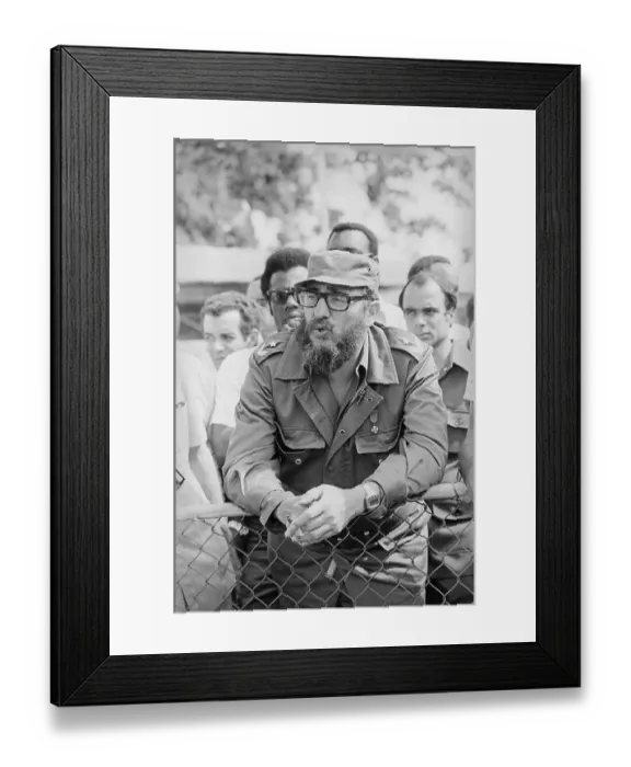Framed Print : Portrait of Fidel Castro Leaning on Fence Framed Print : Portrait of Fidel Castro Leaning on Fence