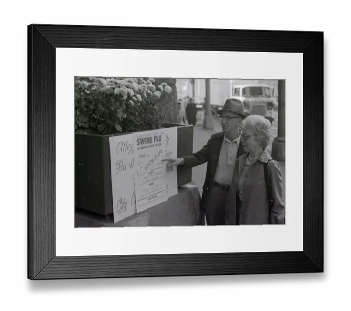 Framed Print : Mr. And Mrs. Dorow Point To A Sign Framed Print : Mr. And Mrs. Dorow Point To A Sign