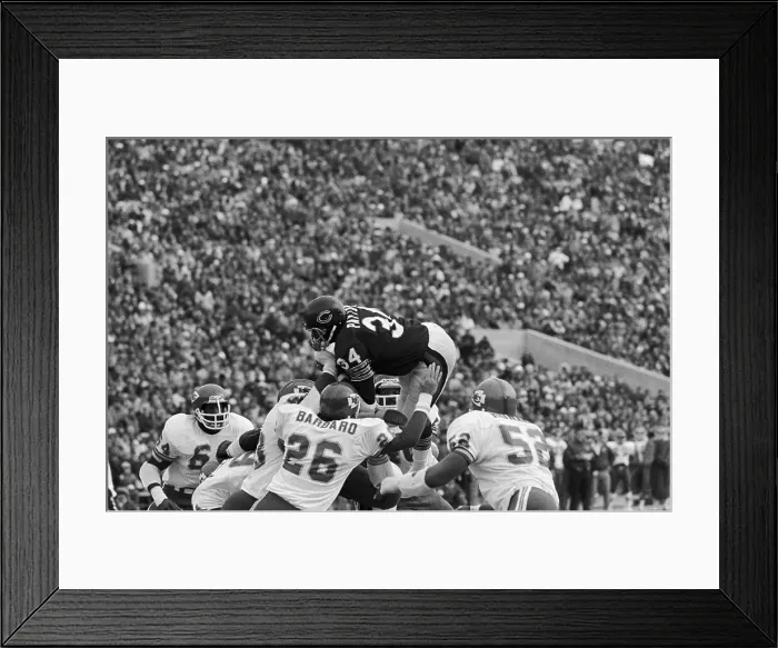 Framed Print : Walter Payton Leaps Over Opponents to Score Framed Print : Walter Payton Leaps Over Opponents to Score