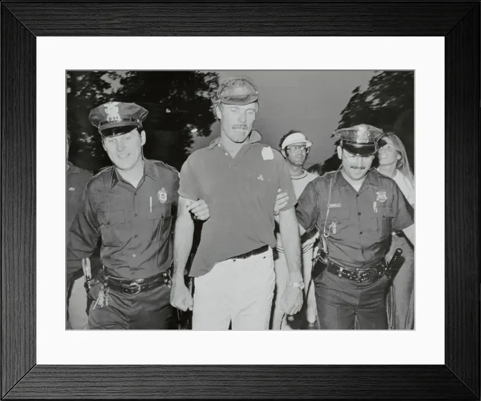 Framed Print : American Cup Winner Ted Turner Being Escorted by Policemen Framed Print : American Cup Winner Ted Turner Being Escorted by Policemen