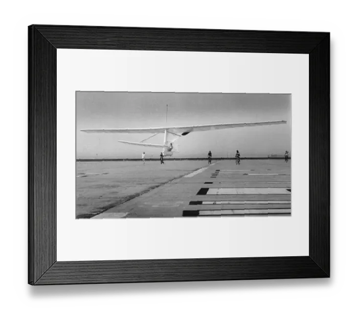 Framed Print : Aircraft Hovering over Air Strip