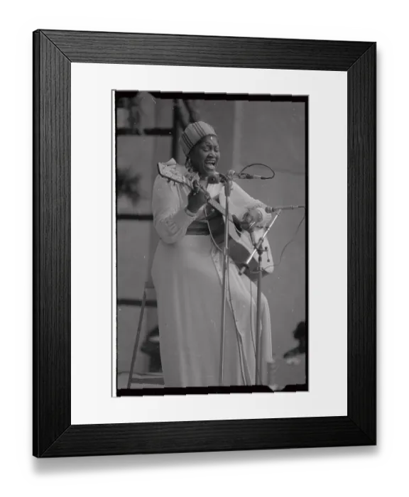 Framed Print : Odetta Playing Guitar and Singing on Stage Framed Print : Odetta Playing Guitar and Singing on Stage