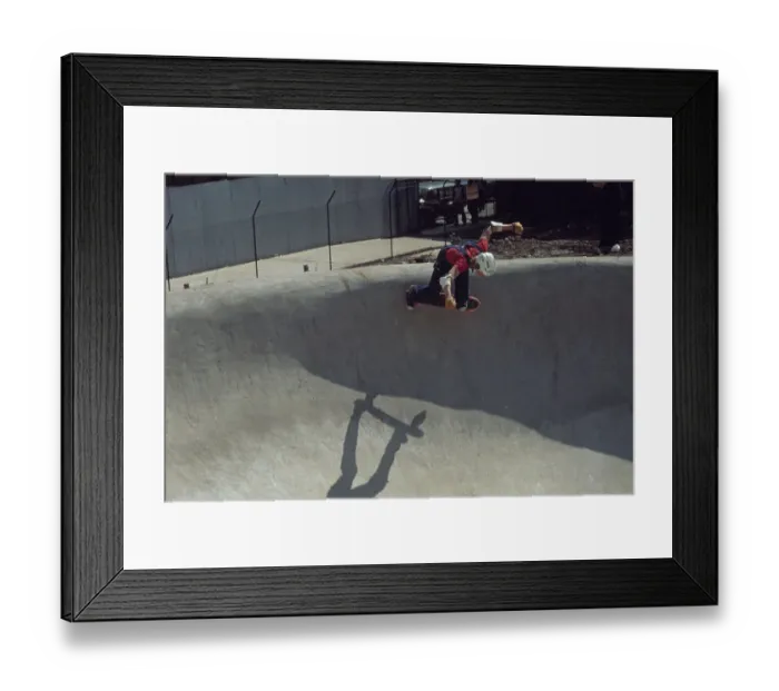 Framed Print : Young Skateboarder