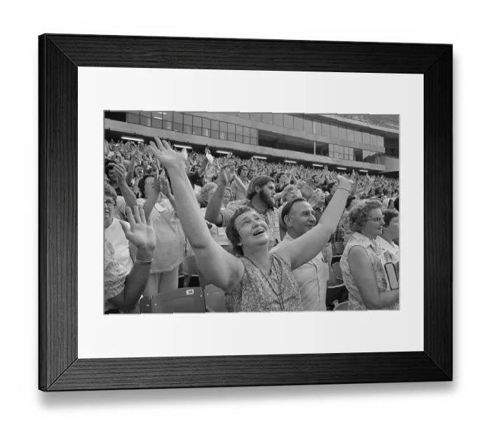 Framed Print : Woman Raising Arms at Religious Conference Framed Print : Woman Raising Arms at Religious Conference