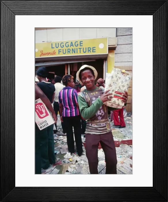 Framed Print : Looter Carrying Pajamas Framed Print : Looter Carrying Pajamas
