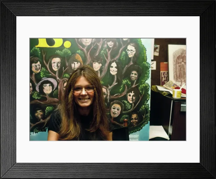 Framed Print : Gloria Steinem Posing in Front of Poster Framed Print : Gloria Steinem Posing in Front of Poster
