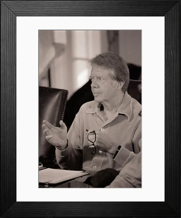Framed Print : Carter Holds Glasses During Meeting Framed Print : Carter Holds Glasses During Meeting
