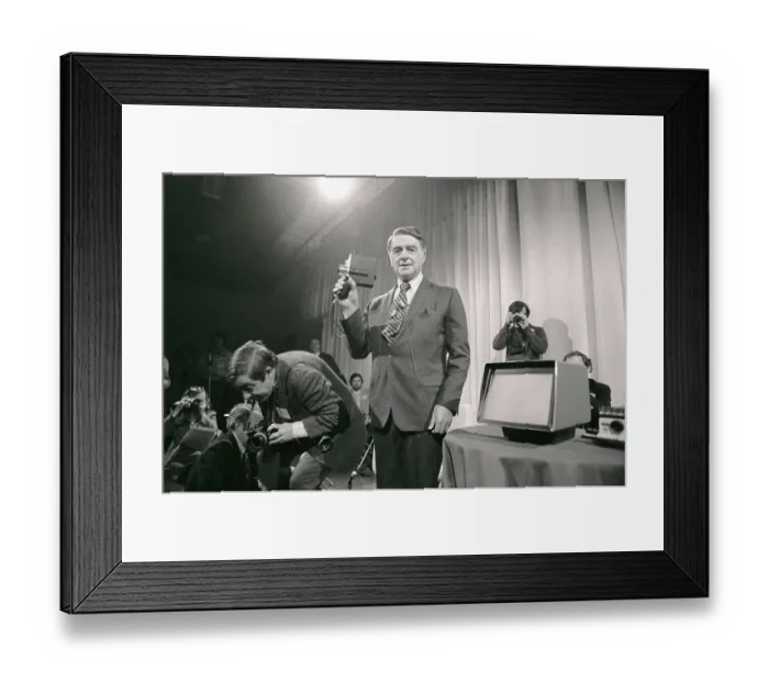 Framed Print : Edwin Land Holding Movie Camera Framed Print : Edwin Land Holding Movie Camera