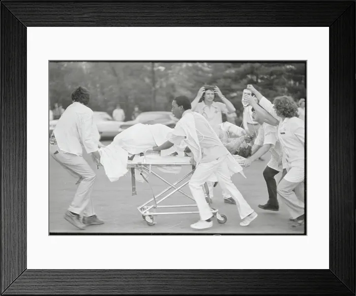 Framed Print : Rescue Workers Rushing Injured Victim Framed Print : Rescue Workers Rushing Injured Victim