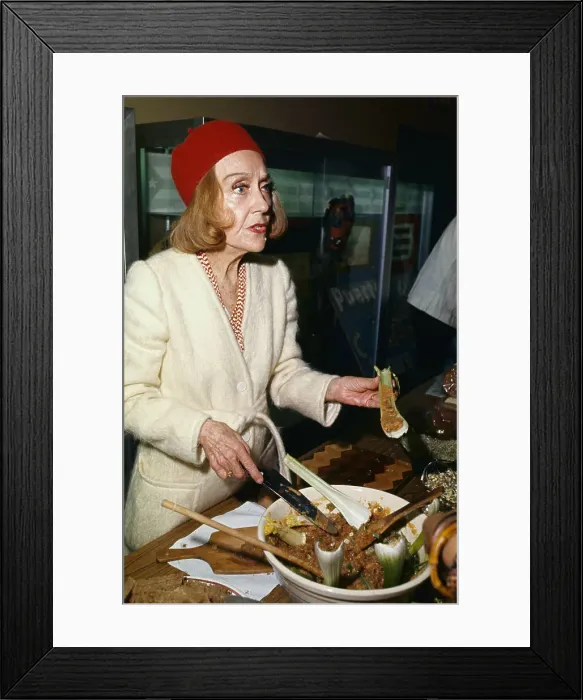 Framed Print : Gloria Swanson Preparing Food Framed Print : Gloria Swanson Preparing Food