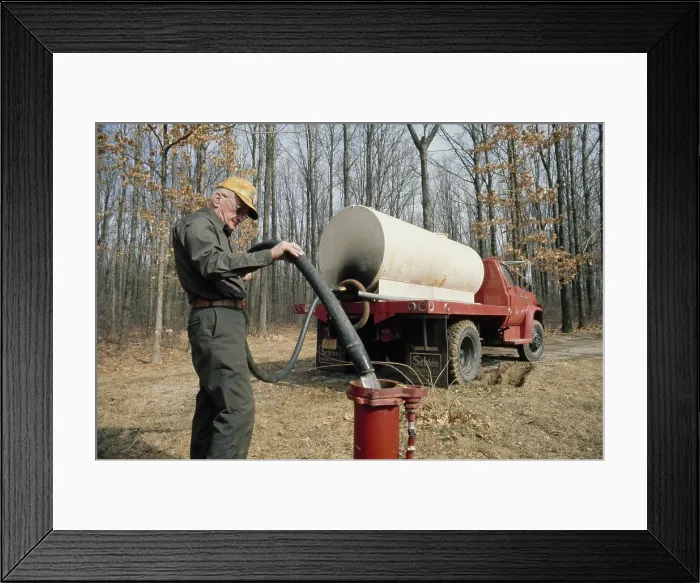 Framed Print : Man Delivering Water Framed Print : Man Delivering Water