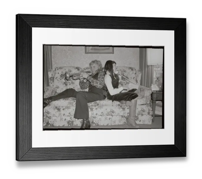 Framed Print : Maynard Ferguson With Trumpet Sitting With Daughter on Phone Framed Print : Maynard Ferguson With Trumpet Sitting With Daughter on Phone