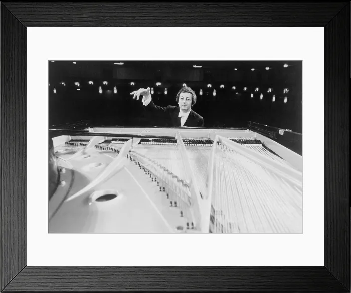 Framed Print : Andre Previn Conducting Orchestra from Behind Piano Framed Print : Andre Previn Conducting Orchestra from Behind Piano