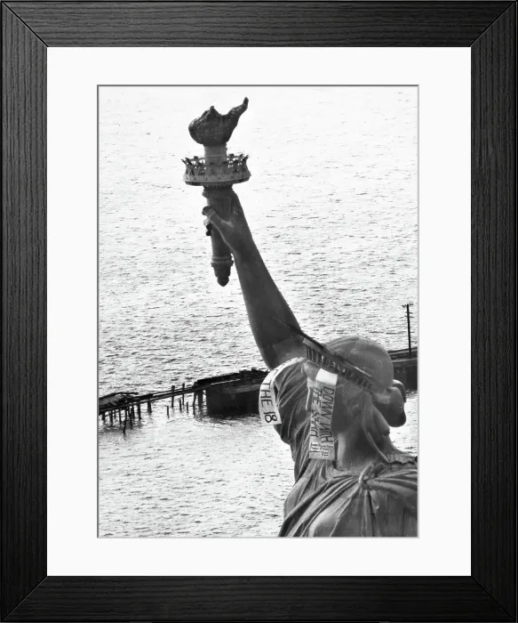 Framed Print : Demonstrators Drop Banners on the Statue of Liberty Framed Print : Demonstrators Drop Banners on the Statue of Liberty