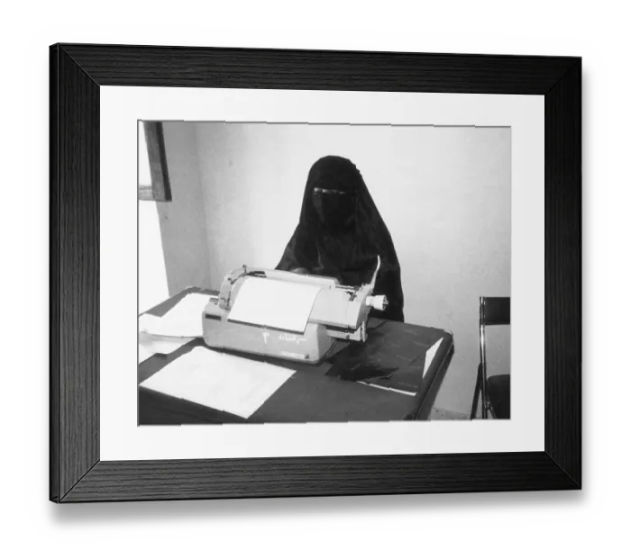 Framed Print : Yemeni Woman Typing in Chador and Veil Framed Print : Yemeni Woman Typing in Chador and Veil