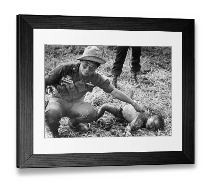 Framed Print : Thai Officer Pointing to Deceased Child Framed Print : Thai Officer Pointing to Deceased Child
