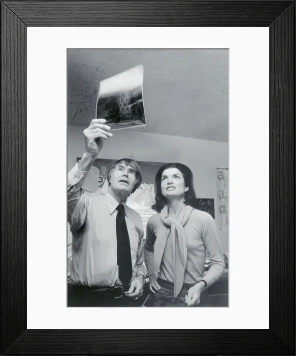 Framed Print : Jacqueline Kennedy Onassis and Bryan Holme Examining Photos Framed Print : Jacqueline Kennedy Onassis and Bryan Holme Examining Photos