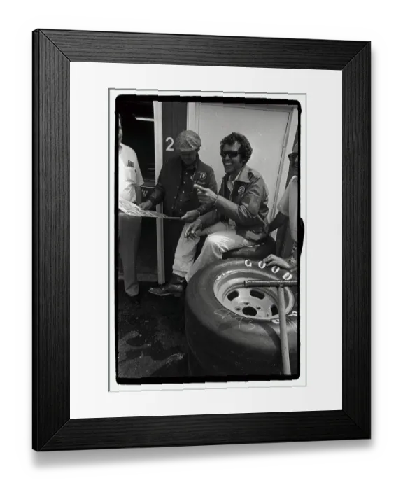 Framed Print : Richard Petty Seated on Tires and Laughing Framed Print : Richard Petty Seated on Tires and Laughing
