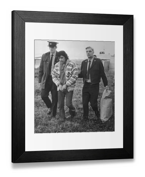 Framed Print : Law Enforcement Officers with a Handcuffed Leonard Peltier Framed Print : Law Enforcement Officers with a Handcuffed Leonard Peltier