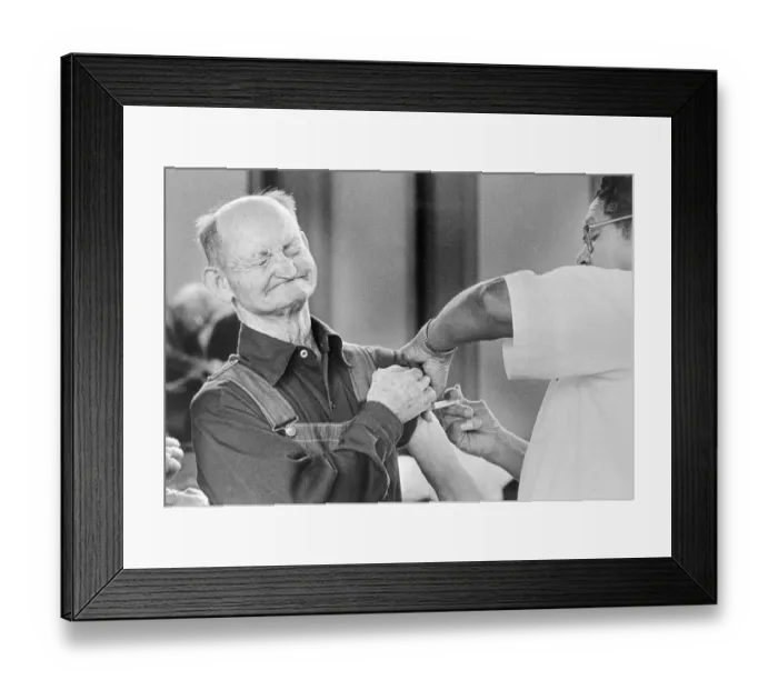 Framed Print : Man Receiving Flu Shot Framed Print : Man Receiving Flu Shot
