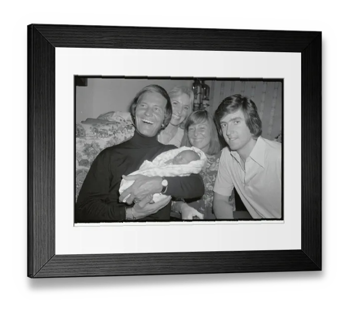 Framed Print : Singer Pat Boone Holding Grandson Framed Print : Singer Pat Boone Holding Grandson