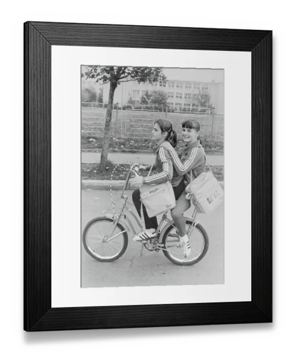 Framed Print : Nadia Comaneci and Friend Riding Bicycle Framed Print : Nadia Comaneci and Friend Riding Bicycle