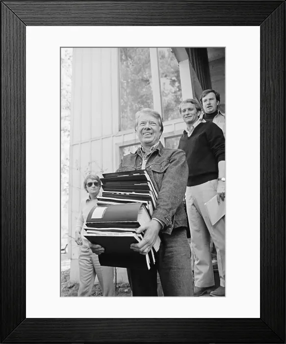 Framed Print : President-Elect Carter Carries Books Framed Print : President-Elect Carter Carries Books