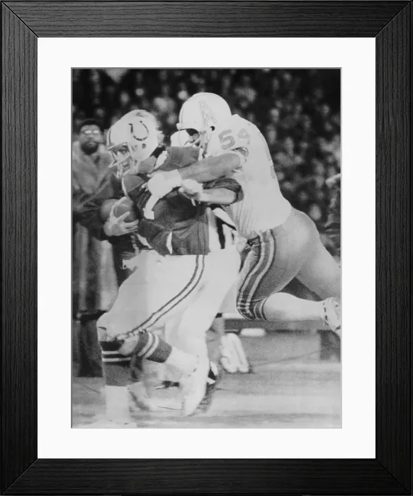Framed Print : Gregg Bingham Tackling Bert Jones Framed Print : Gregg Bingham Tackling Bert Jones