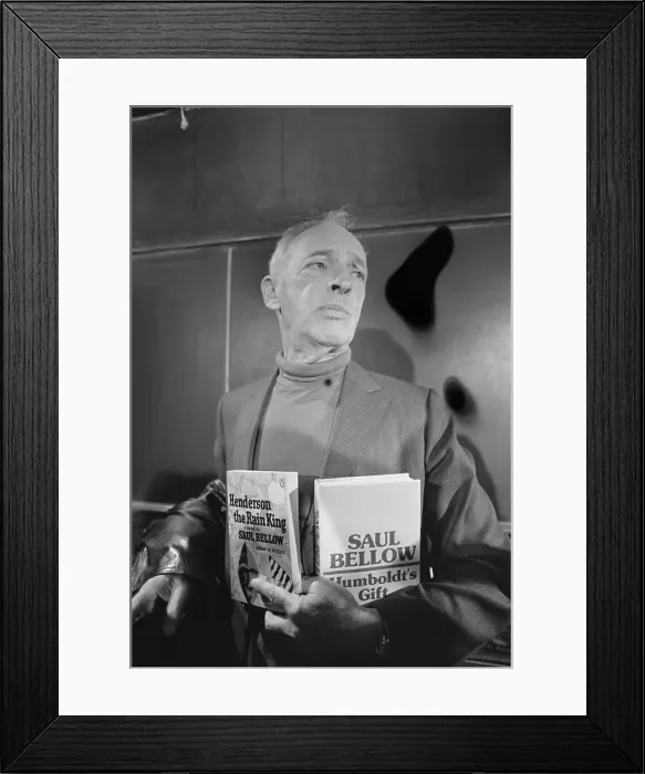 Framed Print : Saul Bellow Displaying Two Novels Framed Print : Saul Bellow Displaying Two Novels