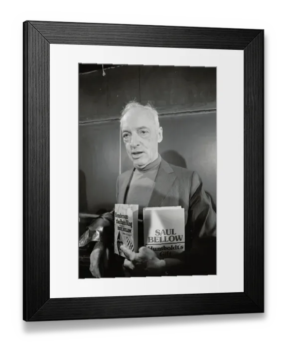 Framed Print : Saul Bellow Displaying Two Novels Framed Print : Saul Bellow Displaying Two Novels