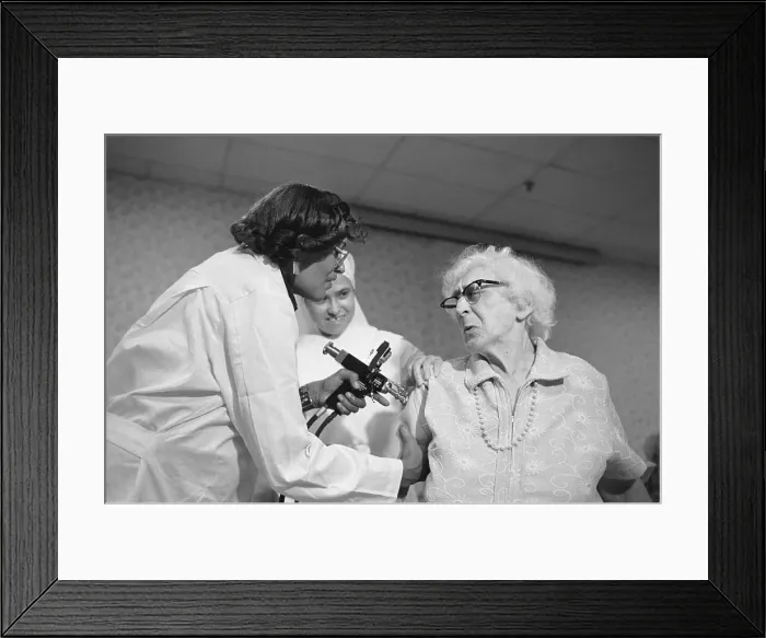 Framed Print : Elderly Woman Wincing As She Is Inoculated for Swine Flu Framed Print : Elderly Woman Wincing As She Is Inoculated for Swine Flu