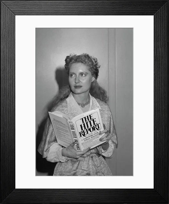 Framed Print : Author Shere Hite Holding The Hite Report