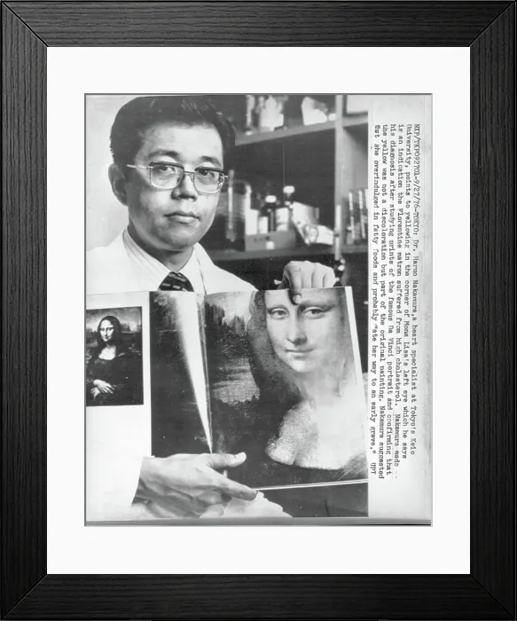 Framed Print : Physician Holding Picture of Mona Lisa Framed Print : Physician Holding Picture of Mona Lisa